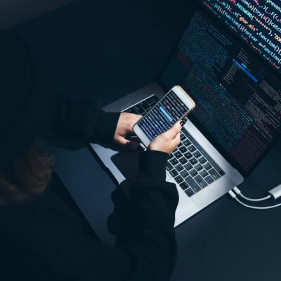 Cyber security threat. Young woman using computer and coding. Internet and network security. Stealing private information. Person using technology to steal password and private data. Cyber attack crime